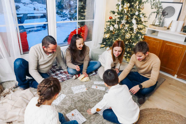Family Gather near a Christmas tree