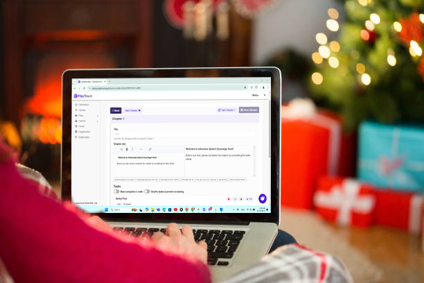 A person who is browsing PlayTours App with a laptop during Christmas Holiday