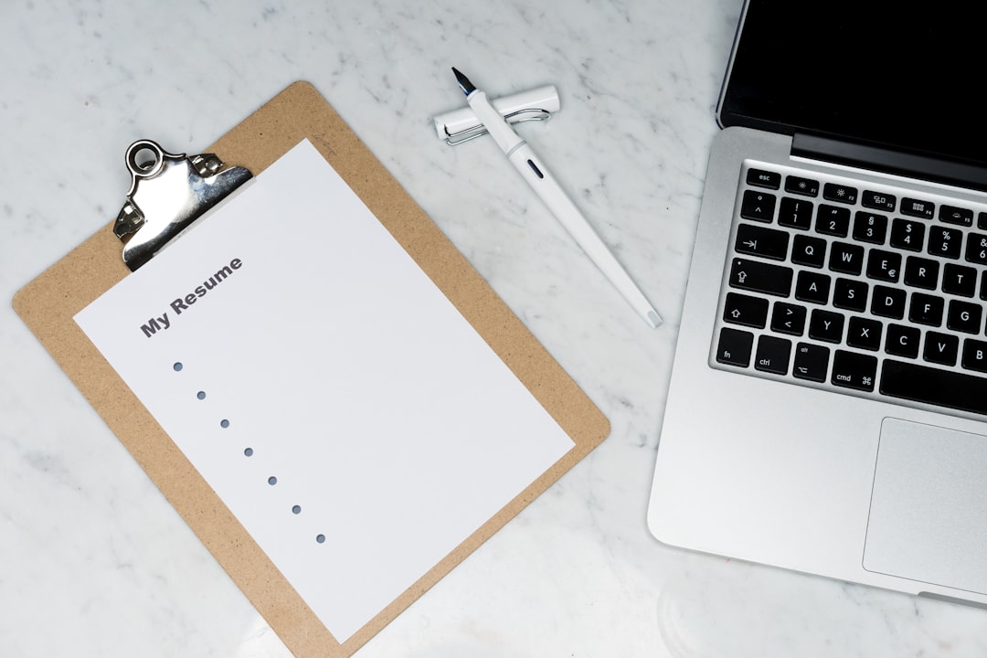 Checklist and laptop for business analysis