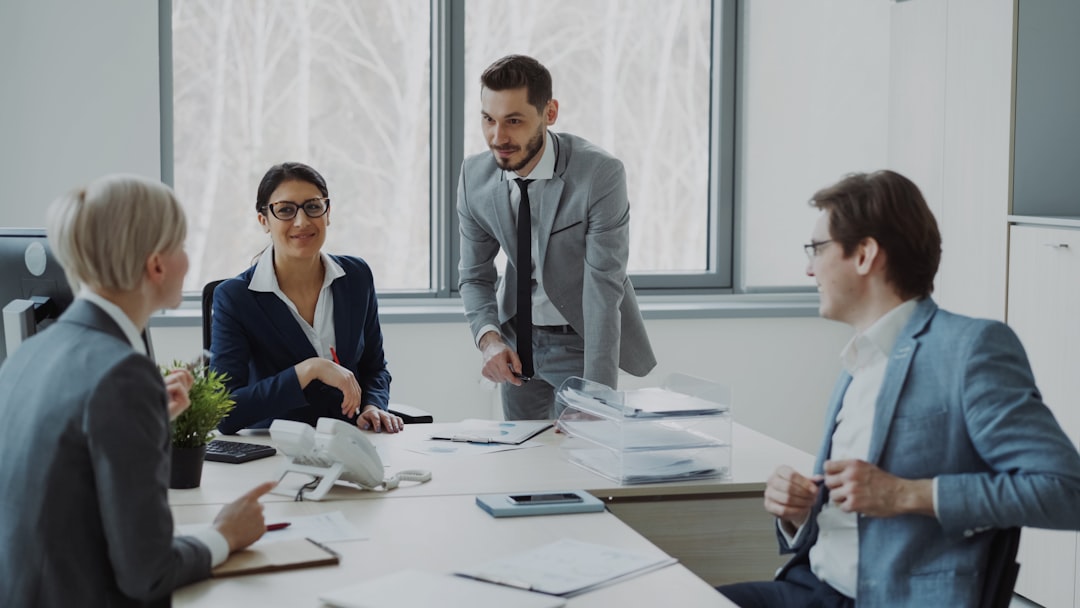Business professionals collaborating around a conference table