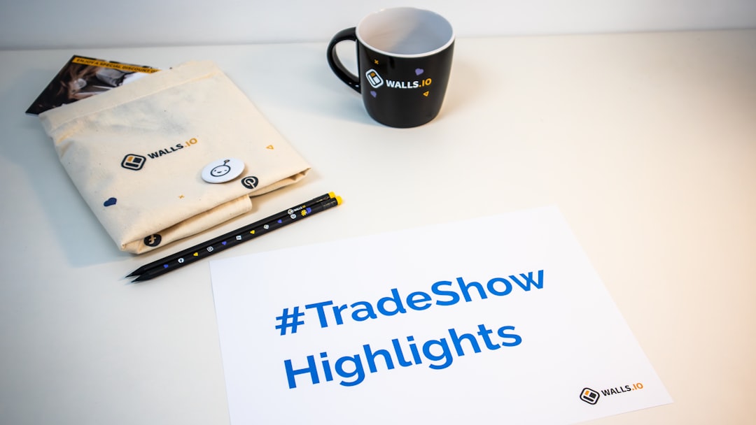 Trade show swag table with branded giveaways and sponsor materials