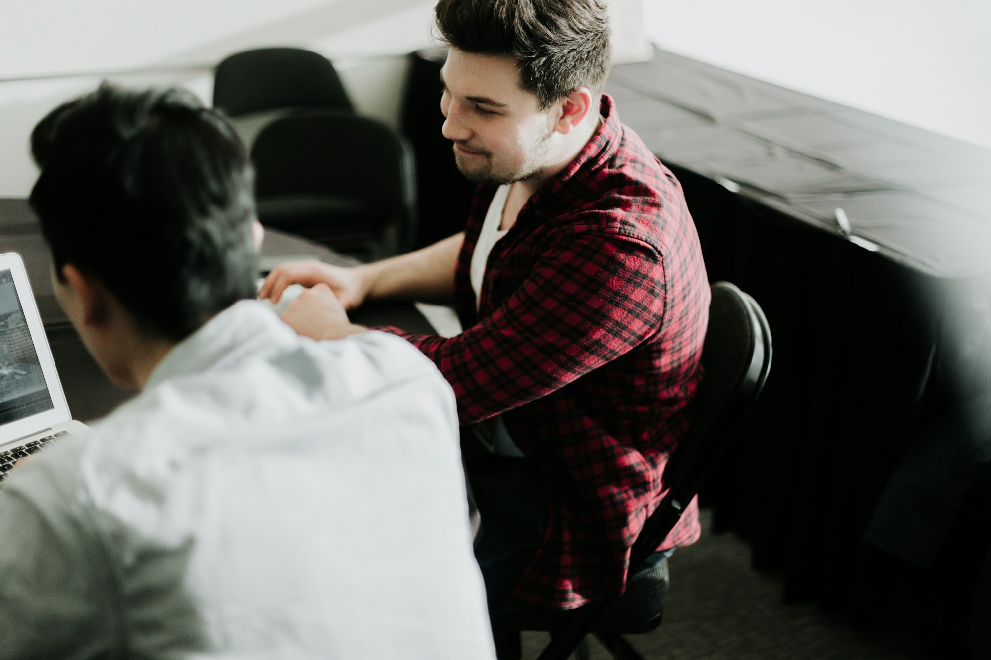 Small business team shaking hands on a deal